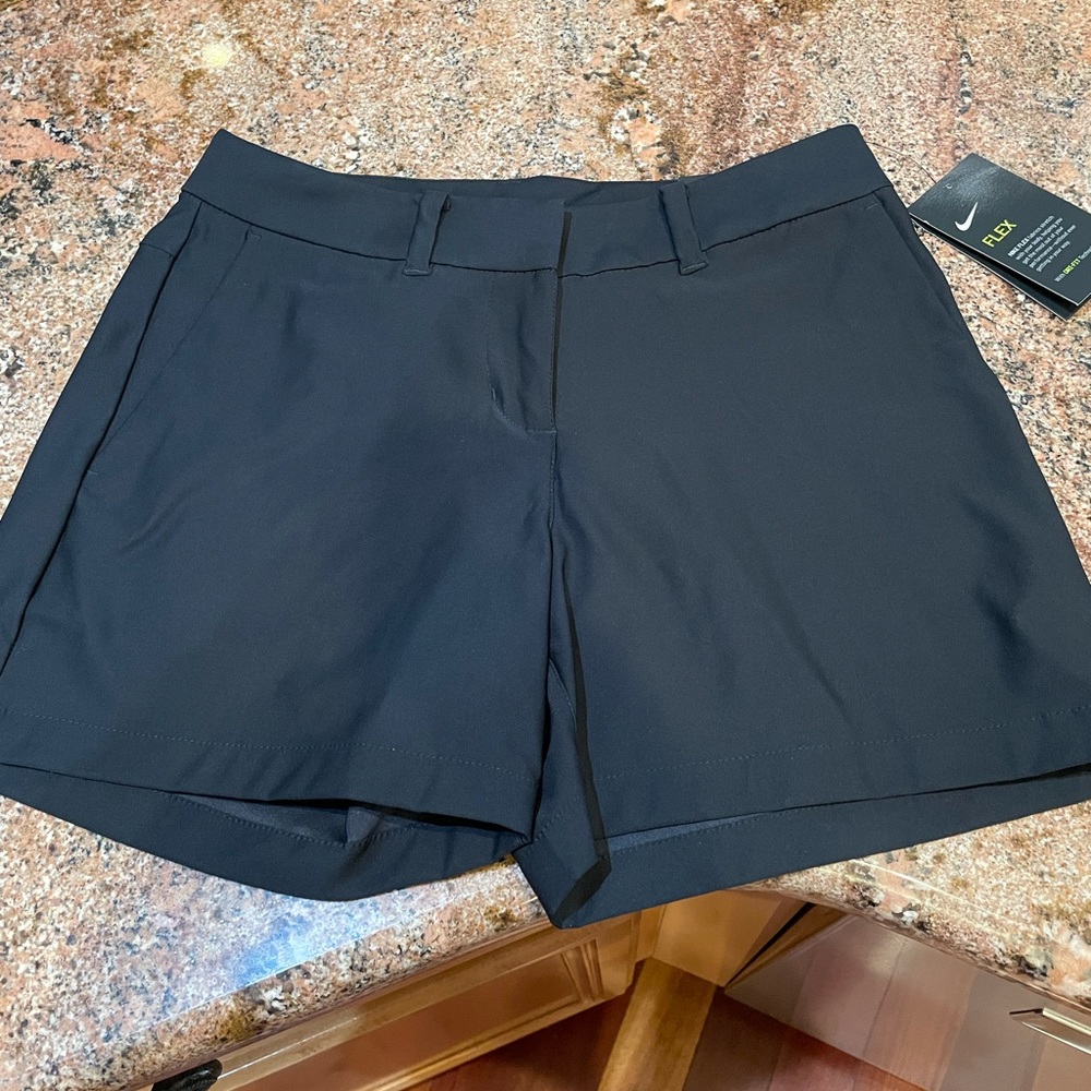 Woman’s Nike Flex black goof shirts size 0